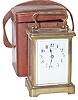 French Carriage clock in a 5 1/2 inch high brass case, by "Delepine-Barrois, France, 11 Jewels", as signed on the movement.