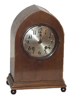 Chelsea Clock Co. bronze metal clock, Gothic style, 10.5" high. — Antique Clocks Price Guide