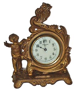 New Haven novelty, 5-1/2 inch gold gilt case, largely worn off, but is still a very prestty bronze color all over. — Antique Clocks Price Guide