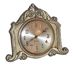 Sessions Clock Co. novelty with an easel stand. — Antique Clocks Price Guide