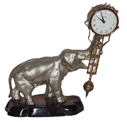 Linden Elephant Swing arm clock, made in Japan. — Antique Clocks Price Guide