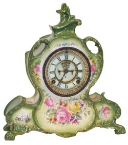 Ansonia Clock Co., Royal Bonn, "LaVendee", ca 1904, always one of the most sought after case styles because of the graceful flourishes, extensions, and openness. — Antique Clocks Price Guide