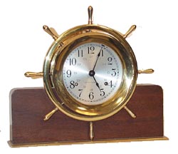 Seth Thomas ShipÕs Bell Clock, the "Corsair E537-000" on a "Helmsman" base of polished mahogany. — Antique Clocks Price Guide