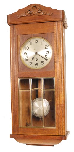 French box clock with 8 day movement striking Westminster chimes on 8 long rods. — Antique Clocks Price Guide
