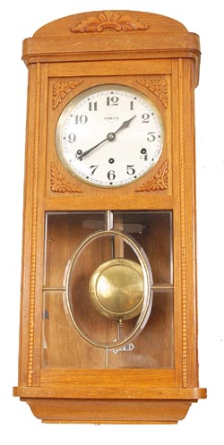 French box clock, 8 day movement striking Westminster Chimes on 10 long rods. — Antique Clocks Price Guide