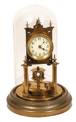 German Anniversary clock with a disc pendulum. — Antique Clocks Price Guide