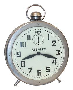 Fake alarm clock. Large nickel case, 15 inches high, with painted clock dial and hands. — Antique Clocks Price Guide