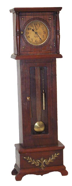 Westclox Baby Ben alarm clock in a tall miniature grandfather clock case. — Antique Clocks Price Guide