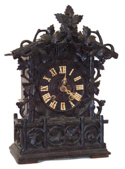 German shelf cuckoo, original and unrestored, except the bellows.I have not seen this movement before and donÕt see anything close in the reference books. — Antique Clocks Price Guide
