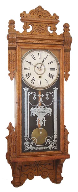 Wm. L. Gilbert Clock Co. hanging clock, "Thespian", ca 1910. — Antique Clocks Price Guide