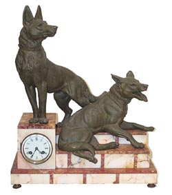 French Figural Clock featuring two nicely detailed spelter statues of German Shepherd dogs, one reclining and one standing. — Antique Clocks Price Guide