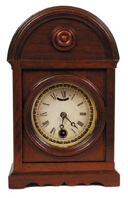 Miniature shelf clock, 9" high. What a neat little clock which I will attempt to describe for you. — Antique Clocks Price Guide