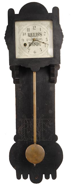 Advertising clock, ca 1865. The label inside the door reads, "This Regulator Clock is Presented by The Geo. W. M. Reed Bitter Co. of New Haven, Conn. thru their Wholesale Agents, as a gift to our patrons, and is intended to attract attention to the merits of, "REEDÕS GILT EDGE TONIC". — Antique Clocks Price Guide