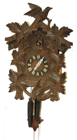 Cuckoo, birds and leaves. Top has taken a few tumbles, glue used liberally, looks fine from the front. — Antique Clocks Price Guide