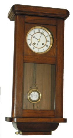 Gustav Becker hanging RA clock, 26" dark oak case, excellent and different from most clocks of this style. — Antique Clocks Price Guide