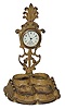 Inkstand clock, ca early 1900Õs. Metal case is 10.5" high, missing the ink bottles.