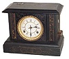 Waterbury Clock Co. "Gamblers Clock", in a regular black case adapted to accommodate the gambler movement and money slots.
