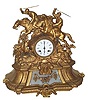 French horse racing clock of gilt spelter and white onyx.