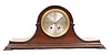 Herschede Hall Clock Co. in a case commonly called tambour.