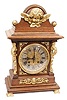 Gustav Becker mantle clock, serial number 772999, which indicatesit was made around 1888. The back of the case has a factory mark "2217".