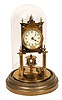 German Anniversary clock with a disc pendulum.