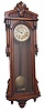 Ansonia Clock Co. hanging clock, "Bagdad", ca 1904. Oak case, 50-1/2 inches high, glass sides.