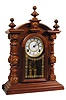 E. N. Welch Clock Co. "Patti No. 1". A contemporary clock made with the identical finials and turned columns on 4 corners as the very collectable original clocks.