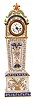 Elaborate and Rare French miniature tall clock, made of porcelain, richly painted and fire glazed. 