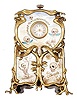 Very rare novelty table clock with a porcelain panel front, behind twisted bronze stand resembling interwoven vines.