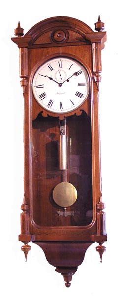 Seth Thomas, "Regulator No. 6", C. 1884. The walnut case is 48" tall and 16.75" wide. — Antique Clocks Price Guide