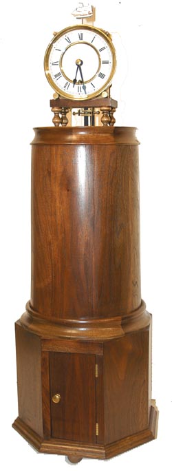 Lighthouse clock utilizing a 30 day Vienna movement with pendulum and weight. — Antique Clocks Price Guide