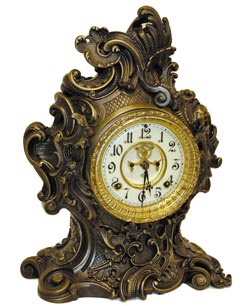 Ansonia Clock Co. mantle clock in a metal case, "Rocco", C. 1894. — Antique Clocks Price Guide