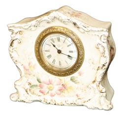 Ansonia Clock Co., small porcelain, "Brant", and so signed on the case. — Antique Clocks Price Guide