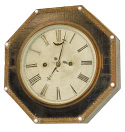S. B. Jerome, 12" octagon gallery, covered with black leather, continuous brass trim around the octagon edge, and the glass buttons at the eight corners. — Antique Clocks Price Guide