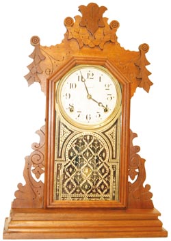 E. Ingraham walnut parlor clock, "Astra", C. 1889. — Antique Clocks Price Guide