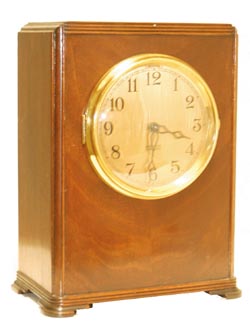 Hamilton-Sangamo Clock, in a shelf style case. Super mahogany case is 11.75" high, some design on each edge. — Antique Clocks Price Guide