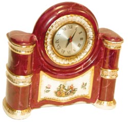 Porcelain clock by, "American Beauty Lamp". — Antique Clocks Price Guide