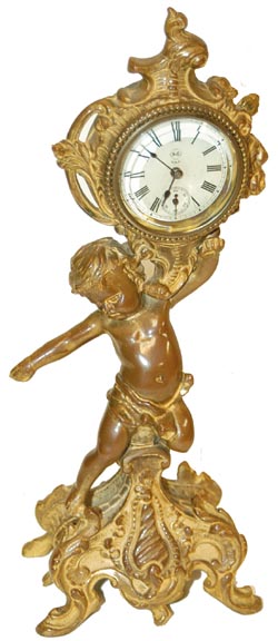 Seth Thomas novelty clock, cupid holding clock. — Antique Clocks Price Guide