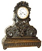 Black Forest carved case with French movement stamped with the Vincente and Cie mark.