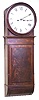 English Dial clock, C. 1850. Case is mahogany veneer with a burl mahogany door and a curved bottom.