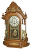 New Haven Clock Co. "Occidental", C. 1895. This is a mirrorside to most clock collectors.