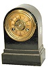 Terry Clock Co. enameled iron case, 6" high. 30 hour, time and alarm.