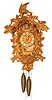 German cuckoo, large refinished case at 24" high, carved all over are leaves, nuts, a fox and a bird on top.