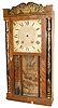 Seth Thomas full size, stenciled column and splat, 30 hour wood movement, weight clock. Mahogany veneer case 34.5" high.