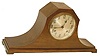 New Haven Clock Co. "Tambour No. 56", according to the label on the base.