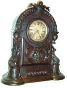 Muller and Kroeber, ca.1868, heavily carved shelf clock. — Antique Clocks Price Guide