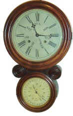 E. Ingraham &amp; Co. Ionic mini calendar, ca.1880 mahogany 21.5 inches high, veneered case refinished and in excellent condition, old glasses. — Antique Clocks Price Guide