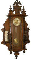 German wall regulator that looks like a Vienna regulator with wings. — Antique Clocks Price Guide