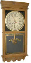 E. Ingraham Clock Co. hanging "Northwestern", ca 1910. — Antique Clocks Price Guide