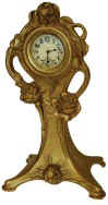 American made novelty clock, no name but there are 4 large roses and vines over the case. — Antique Clocks Price Guide